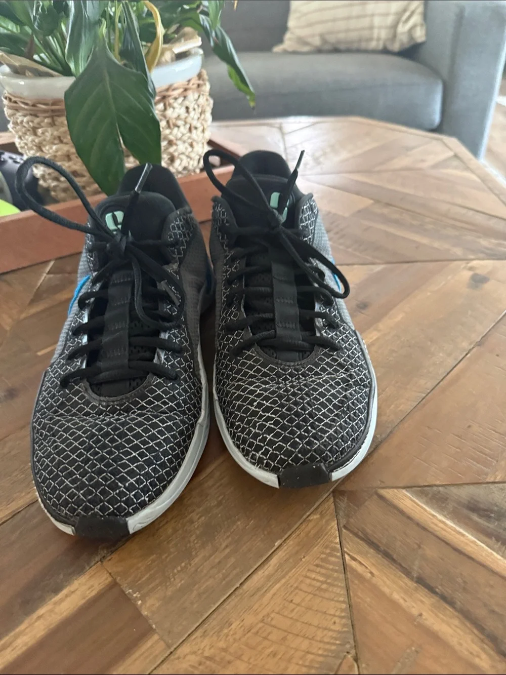 Nike Men’s Gray Athletic Shoes with Blue Swoosh